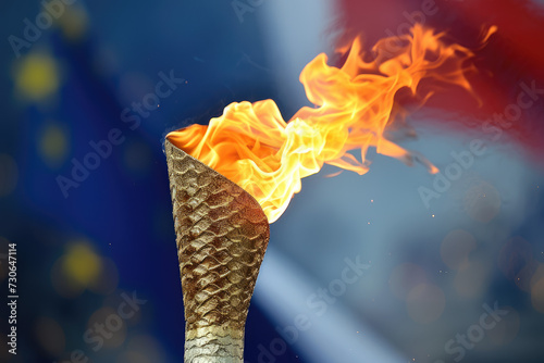 Flaming torch in front of the french flag