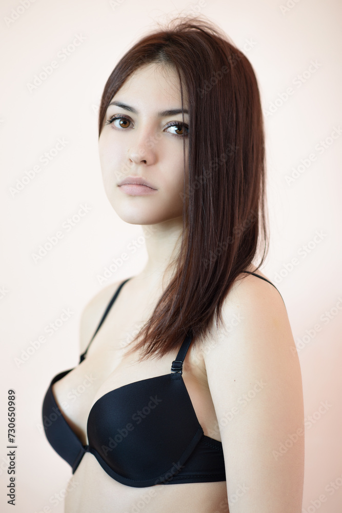 Fototapeta premium Beautiful brunette in black bra.