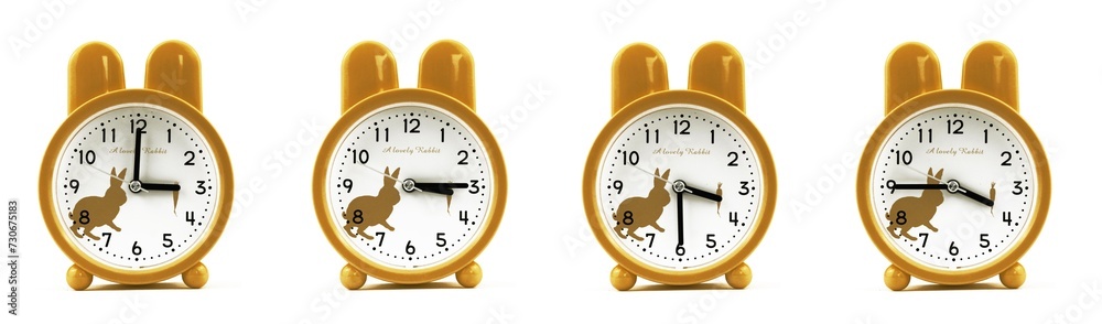 close up of a set of cute brown alarm clocks showing the time; 3, 3.15, 3.30 and 3.45 p.m dan a.m. Isolated on white background
 - obrazy, fototapety, plakaty 