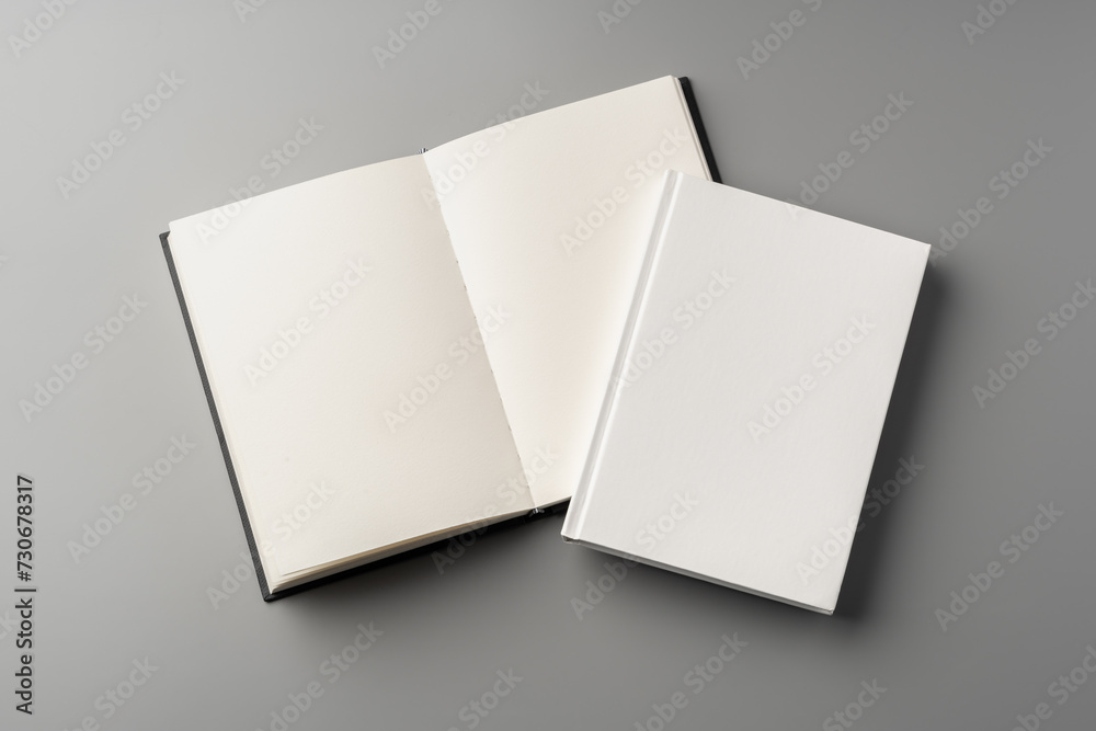 Blank notepad on gray background studio shot Blank notepad on gray background studio shot