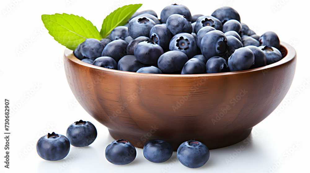 Studio Shot of Blueberries in Wooden Bowl on White Background. Crisp and Colorful. Studio Shot of Blueberries in Wooden Bowl on White Background. Crisp and Colorful.