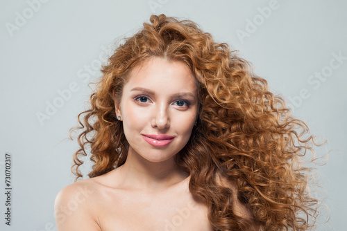 Young female model beauty portrait. Natural beauty woman with long hair and prfect fresh clear skin. Cosmetology, facial treatment, skincare and hair styling concept