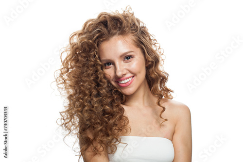 Friendly female model beauty portrait. Natural beauty woman with long hair and prfect fresh clear skin. Cosmetology, facial treatment, skincare and hair styling concept photo