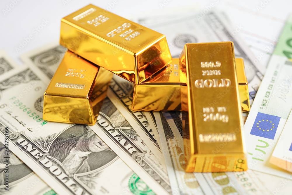 Gold bars with US dollar and Euro banknote money, finance trading investment business currency concept. Gold bars with US dollar and Euro banknote money, finance trading investment business currency concept.
