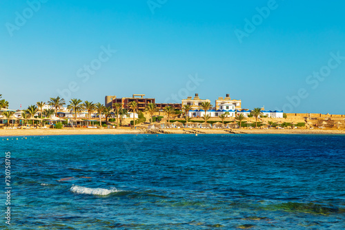 Fototapeta Naklejka Na Ścianę i Meble -  Sunny resort beach on the shores of the Red Sea.
