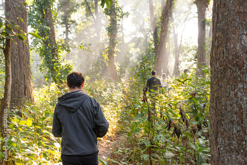 Men walking into the forest in Nepal incredible nature photo