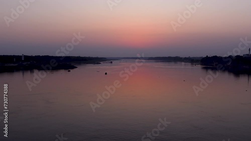 Sundown view in the evening time at Mahananda River, Bangladesh in Asia. photo