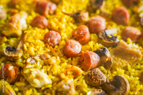 Close-up of paella with various ingredients.
