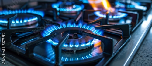 A gas stove with electric blue flames, resembling automotive tire rim, offers captivating effects similar to automotive lighting.