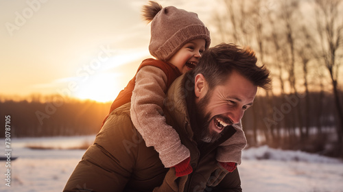 Joyous winter playtime with father and child