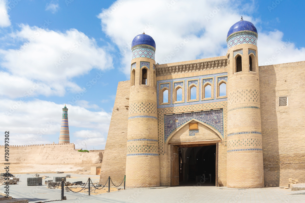 West Gate of the Itchan Kala ornamented with famous majolica. Fortress (Arc) of Khiva (Xiva) in Uzbekistan