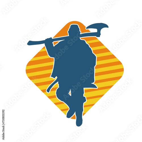 Silhouette of a male warrior carrying broad bladed war axe. Silhouette of a viking warrior with bearded axe weapon in action pose.