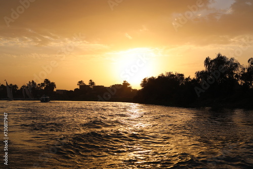 Scenic sunset over the river. Beautiful Nile River on a sunny day.