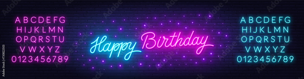Happy Birthday neon text on brick wall background