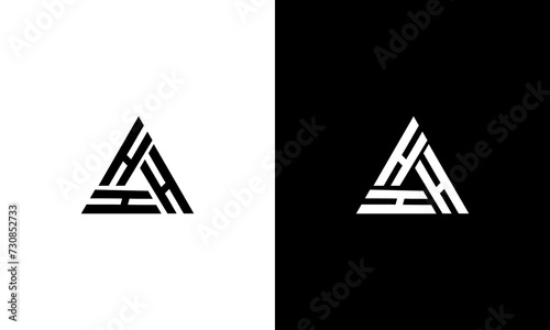 initial H triangle monogram logo design vector