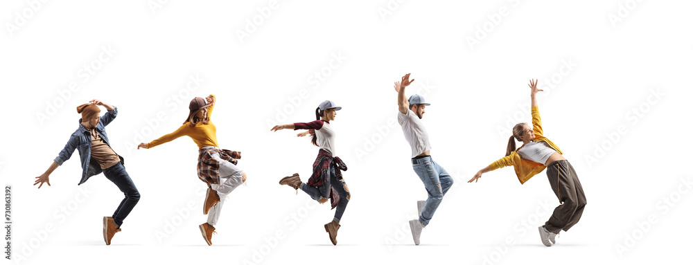 Young men and women dancing in a line