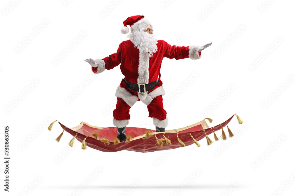 Santa claus flying on a magic carpet Santa claus flying on a magic carpet