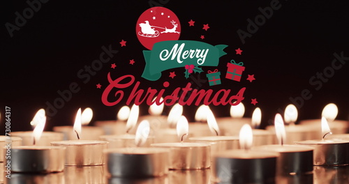 Image of merry christmas text over lit tea candles background