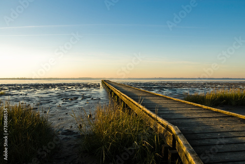 Jetty in Dangast on the Jade Bay on the German North Sea coast.