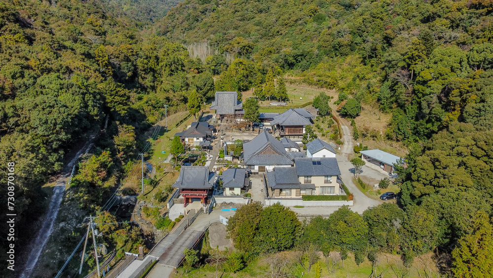 Aerial view of houses and rolling hills in Tokushima Prefecture, Japan.