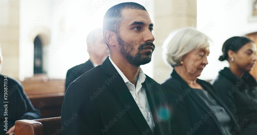 Obraz premium Sad, man and face closeup with depression at a funeral in church for religious service and mourning. Grief, male person and burial with death, ceremony and grieving loss at chapel event in a suit