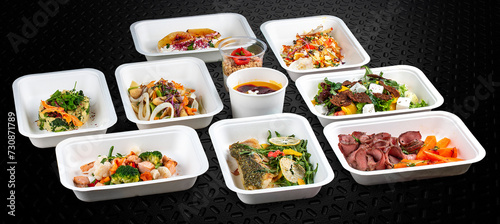 Colorful and nutritious meal kits prepared in eco-friendly containers for a convenient and healthy on-the-go meal.