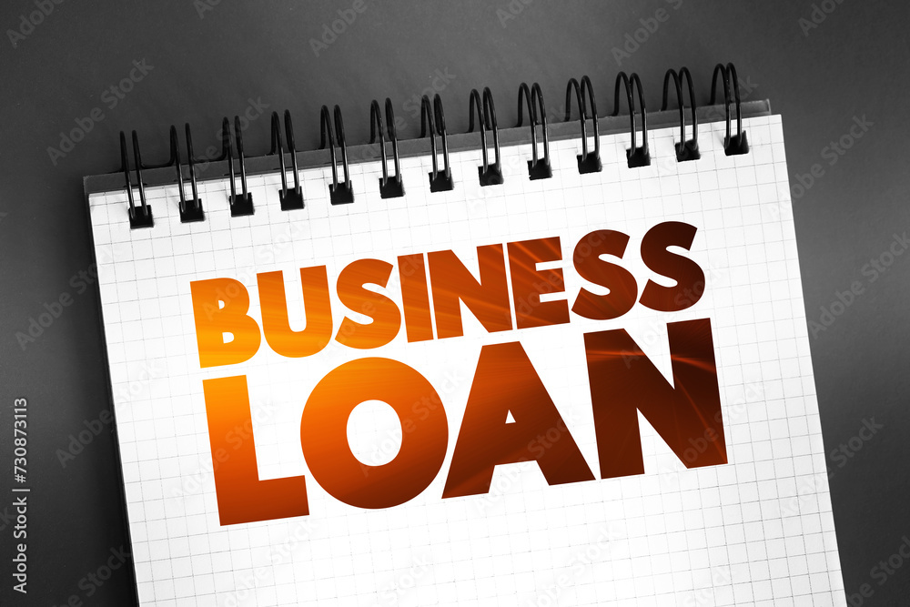 Fototapeta premium Business Loan text on notepad, business concept background