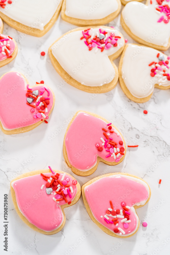 Heart-shaped sugar cookies with royal icing