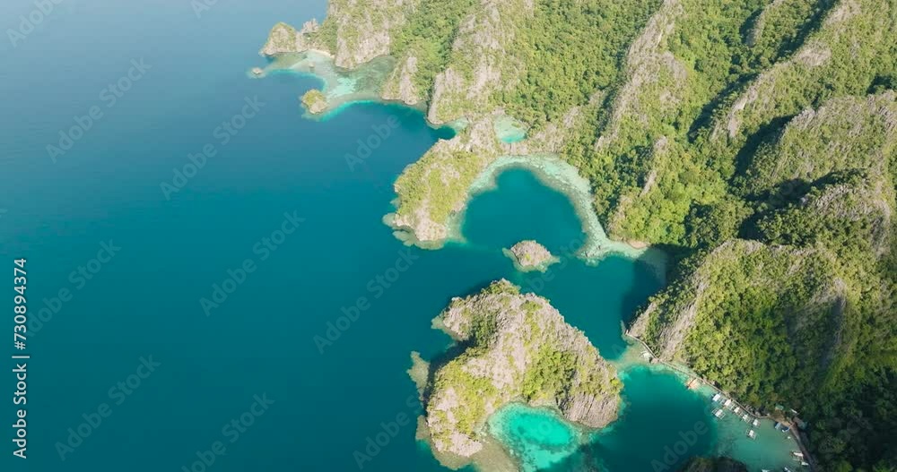 Lagoons with blue water and splendid limestone rock formation in Coron, Palawan. Philippines.