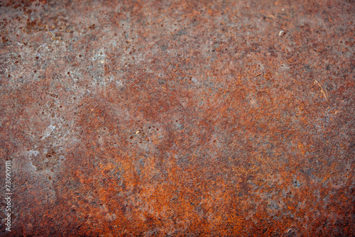 Grunge rusty metal texture, rust and oxidized metallic background. Close-up worn corroded iron.