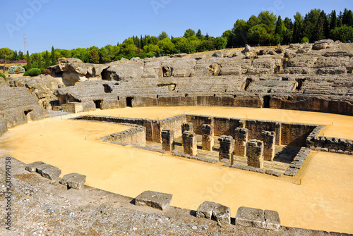 Roman amphitheater of the ancient Roman city of Italica, birthplace of Emperor Trajan in Santiponce, Seville province, Spain. Roman cities of Hispania. #730914758