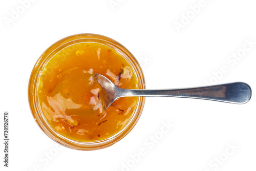 Seabuckthorn jam in glass jare with spoon isolated on a white background. Top view photo