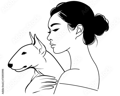 girl holding the dog. Bull Terrier dog with its owner