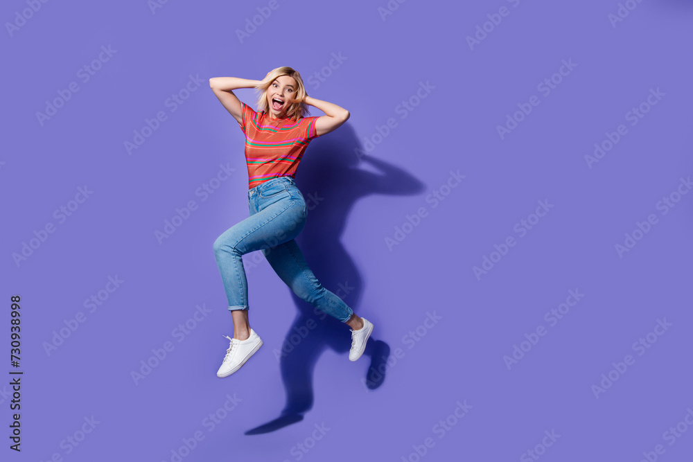 Full body photo of young girl shocked hands touch head confused watching deadlines for course job isolated on purple color background