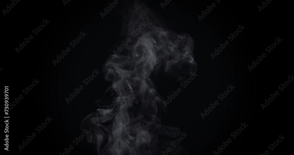 White natural rising steam from food or hot drink isolated on a black background. Сan be used in any projects with hot food. Slow motion White natural rising steam from food or hot drink isolated on a black background. Сan be used in any projects with hot food. Slow motion