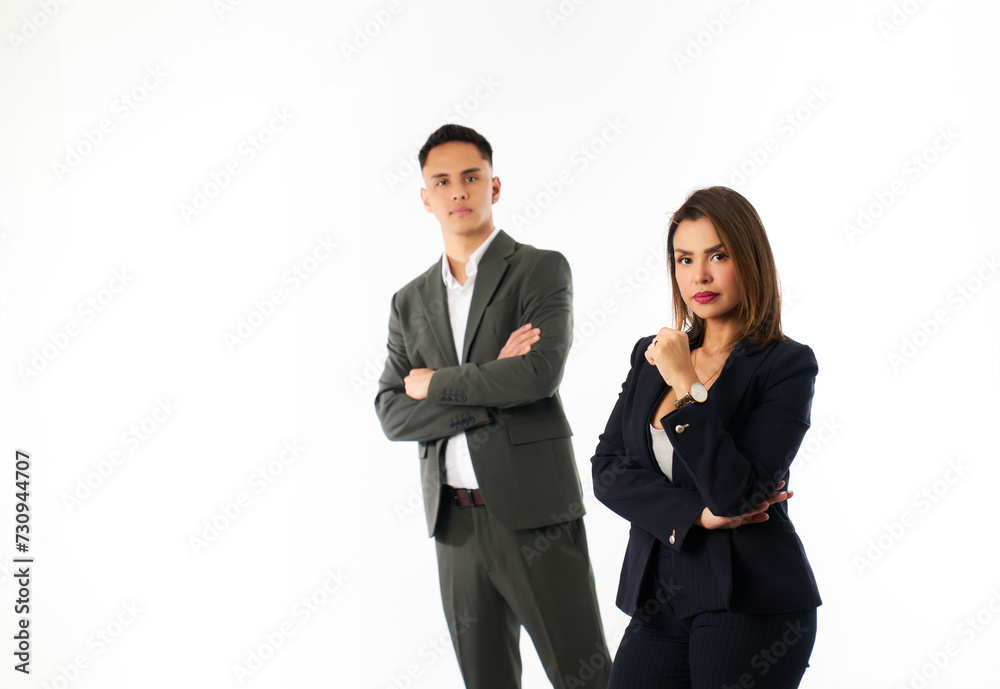 corporate team portrait of a male and female businessman in studio with white background corporate team portrait of a male and female businessman in studio with white background