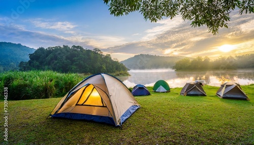 camping and tent in nature park with sunrise