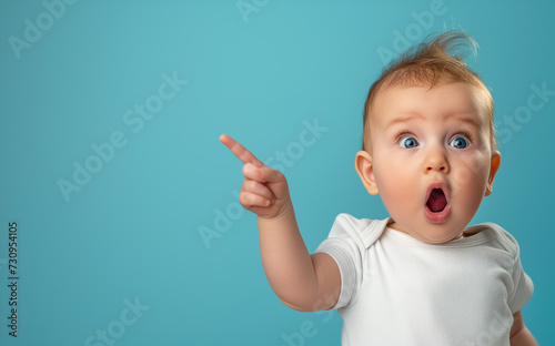 Surprised Baby Pointing At Background Copy Space