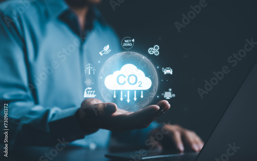 Carbon footprint concept. Holding carbon reduction icon. Net zero and carbon neutral, Carbon emissions, CO2 neutrality, Sustainable energy, environment, climate change, Global warming, Greenhouse gas,
