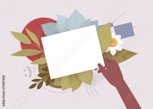 Blank white paper sheet, empty card mockup hold in black hand. Florist message card holder. Greeting, holiday, wedding, banquet party invitation, business announcement template on botanical background