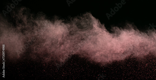 Pink powder dust smoke on black background