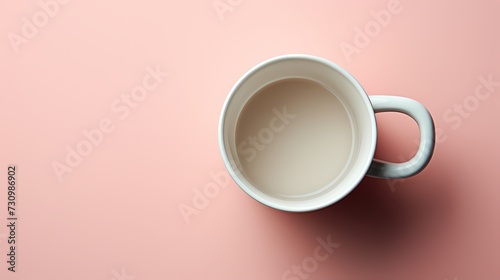Top view of a handmade ceramic mug mockup on a solid background