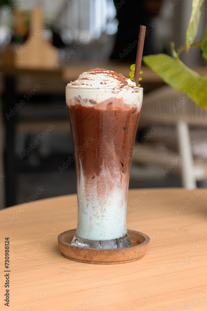 Chocolate mint latte with iced and whipping cream on top. Mint Choc is a nickname of drink. Chocolate mint latte with iced and whipping cream on top. Mint Choc is a nickname of drink.