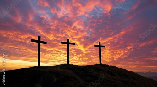 Sunrise with Three Crosses on a Mountain Top Silhouetted Against a Red Cloudy Sky