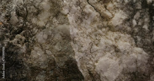 Stone texture close-up. rought mountain surface. macro shot of a rock. natural mineral background.  photo