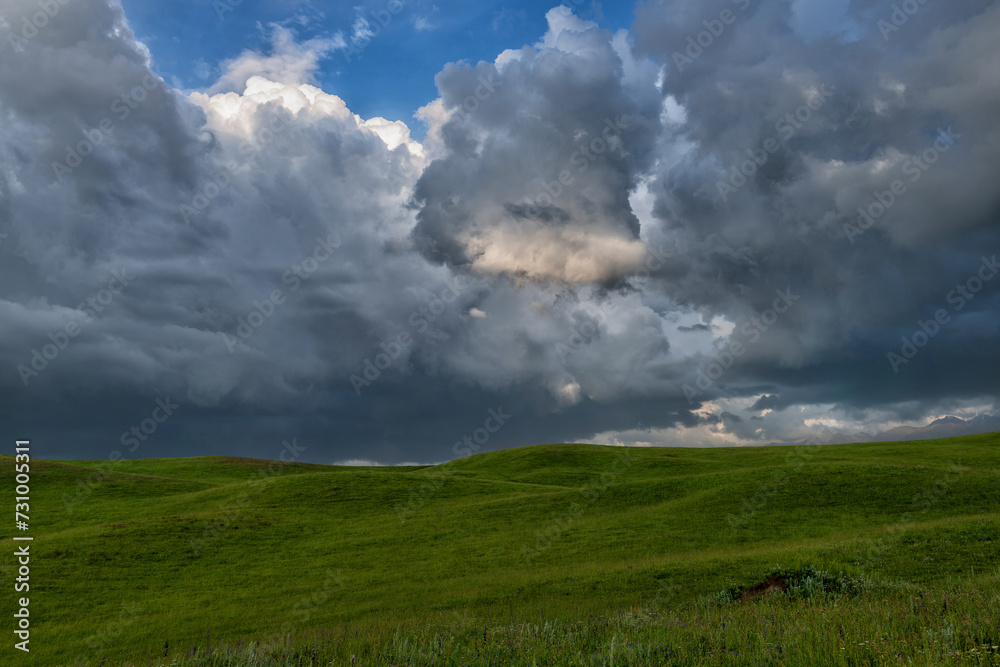 Expressive sky over a high mountain plateau on a summer evening Expressive sky over a high mountain plateau on a summer evening