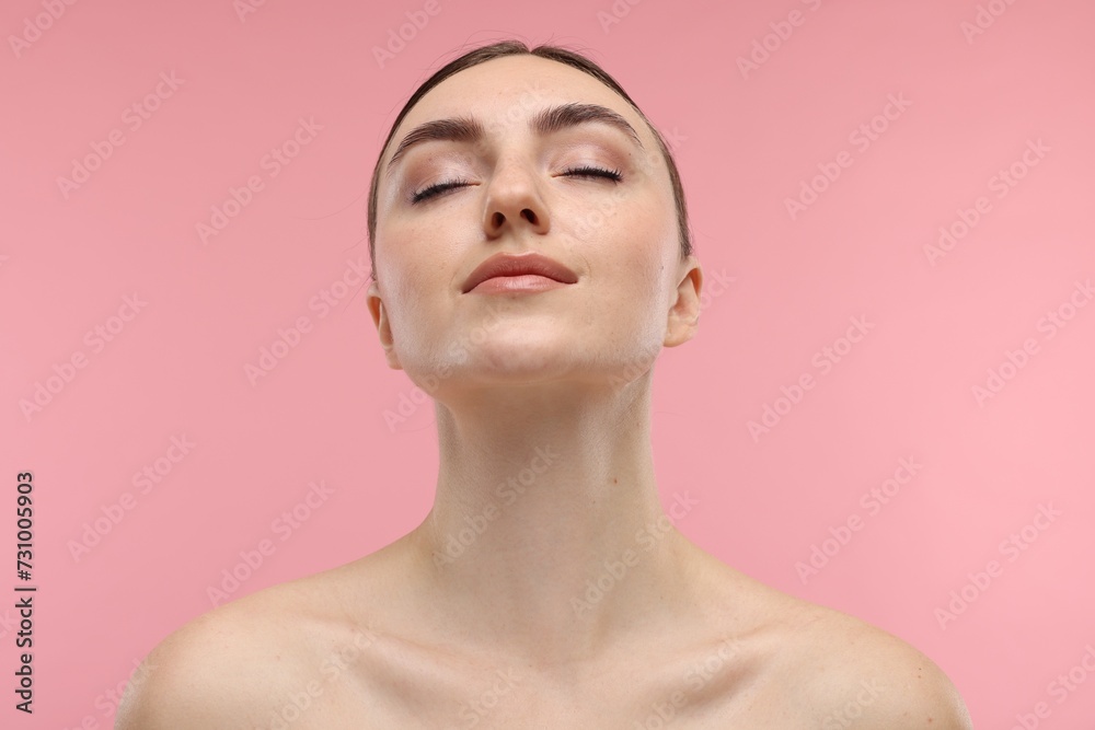 Portrait of beautiful woman on pink background Portrait of beautiful woman on pink background