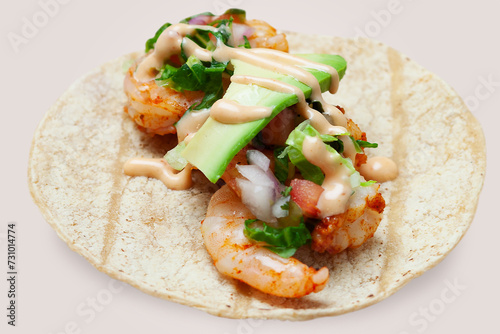 Shrimps tacos, vegetables, avocado. with Pineapple Chipotle Sauce, Mexican food. photo