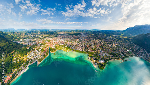 Annecy, France. Lake Annecy with surrounding mountains and villages. Panorama in summer. French Alps. Aerial view photo