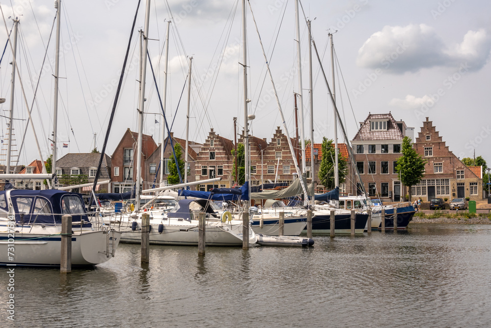 Marina Pekelharinghaven and old warehouses in Medemblik, Noord-Holland, Netherlands
